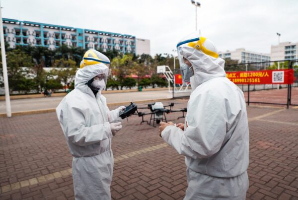 Hazmat team using DJI Agras T30 Drone for sanitization