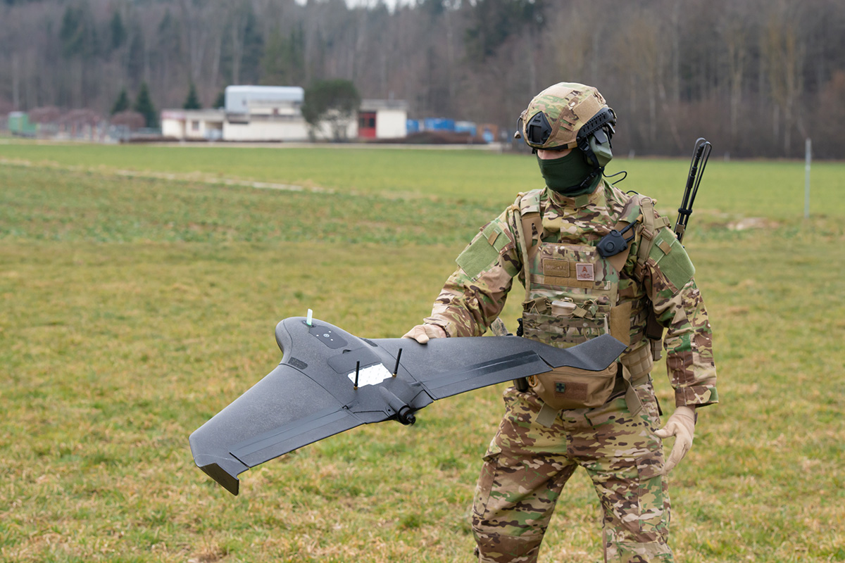 Military drone pilot launching eBee-Vision